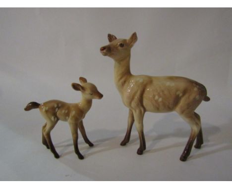 A Beswick figure of a Doe, model no. 999A together with a Beswick Fawn, model no. 1000B