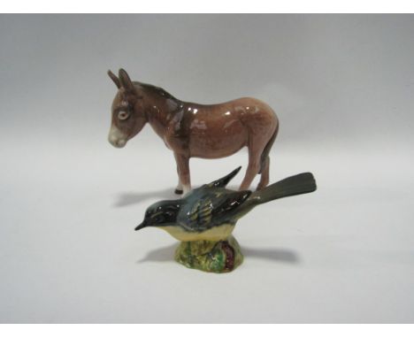 A Beswick Donkey in gloss, model no. 1364B and a Beswick Grey Wagtail in gloss, model no. 1041A (restored)