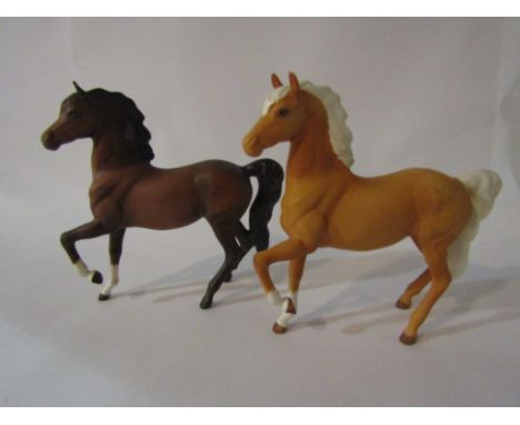 Two Beswick Prancing Arab type horses - Palomino in matt and brown in matt, model no's H1261