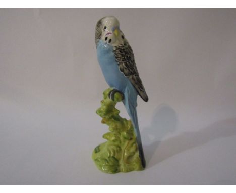 A Beswick Budgerigar - facing left in blue gloss, model no. 1216B