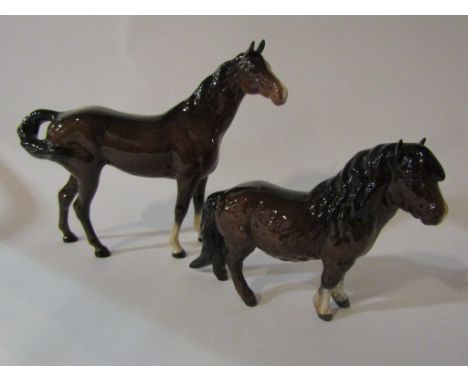 A Beswick Swish tail horse in brown gloss, model no. 1182 and a Beswick Shetland Pony (woolly Shetland mare) in brown gloss, 