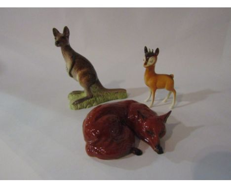 A Beswick figure of a Kangaroo, model no. 1160 together with a Beswick Fox - curled, model no. 1017 and a Beswick Chamois, mo