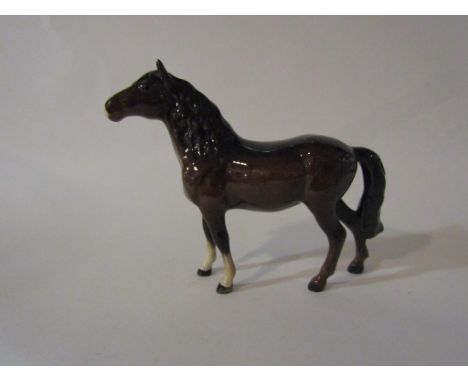 A Beswick Pony (head up) in brown gloss, model no. 1197