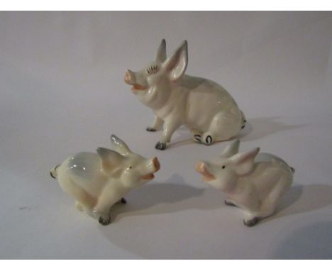 A Beswick Pig, model no. 832 together with two Beswick Piglets - running, model no's 833