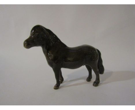 A Beswick Shetland Pony "Eschonchan Ronay" in brown gloss, model no. 1648 (ear restored)