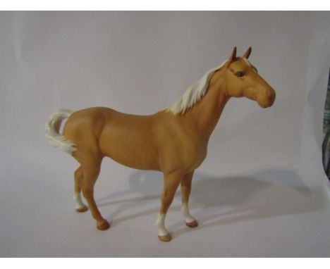 A Beswick Swish tail horse in Palomino matt, model no. 1182