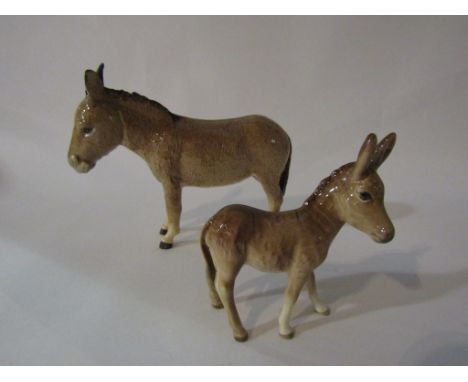 A Beswick Donkey, model no. 2267A together with a Beswick Donkey Foal, model no. 2110