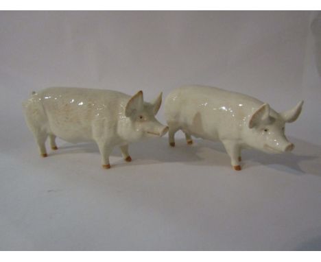 A Beswick Boar ch."Wall Champion boy 53rd", model no. 1453A together with a Beswick Sow ch."Wall Queen 40th" model no, 1452A