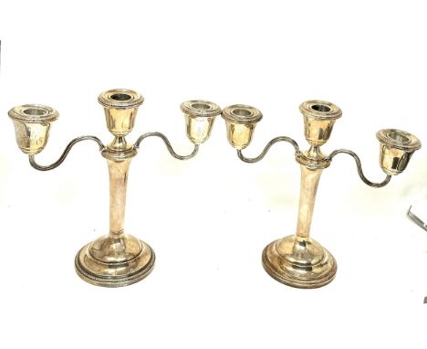 pair of silver hallmarked candelabra  weigh approx 1260g  measure approx height 22cm by 22cm wide birmingham silver hallmarks