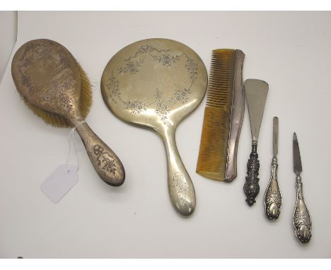 A Matching Hallmarked Silver Backed Hair Brush and Hand Mirror, Birmingham 1919, detailed with ribbon tied floral swags; toge