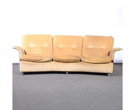 Rare 'Tulip' design three-piece lounge suite, by G-Plan, comprising curved three seat sofa and two armchairs, with shaped and