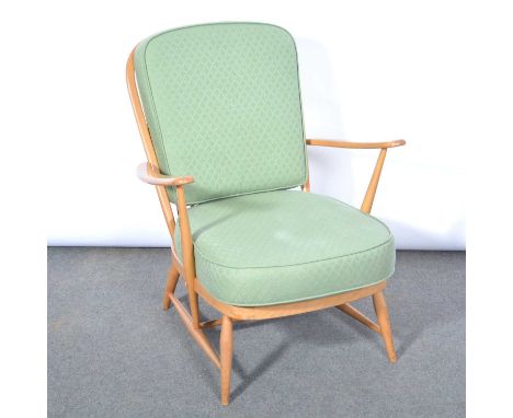 Ercol, a beech-framed Windsor easy chair, green cotton upholstered cushions, applied label, width  70cm, depth 79cm, height 8