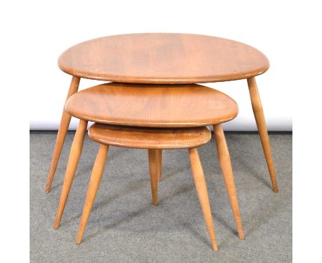 A nest of 'Pebble' tables by Ercol, model 354, the largest width 65cm, depth 45cm, height 40cm.