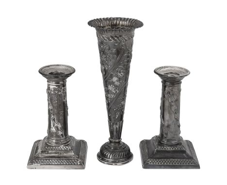 A pair of late Victorian silver dwarf candlesticks and a spill vasefirst London, 1896, Thomas Bradbury &amp; Sons, fitted wit