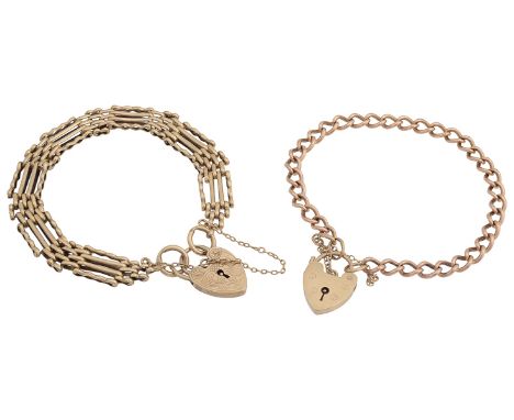 9ct gold four-bar gate bracelet stamped '375' to link, with 9ct gold heart padlock, stamped '9.375' with safety chain togethe