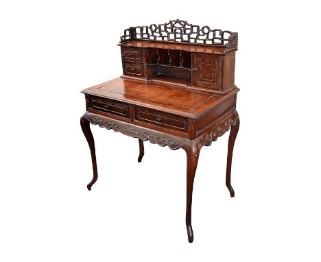 A Chinese blackwood writing tablelate 19th centuryin two parts, the upper section with an openwork gallery above central pige