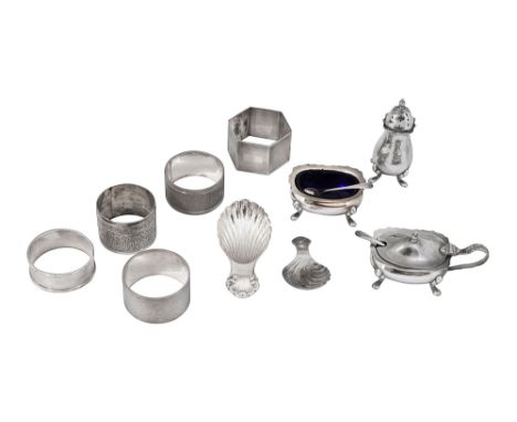 An Elizabeth II silver three piece cruet set, two caddy spoons and assorted napkin rings first Birmingham, 1957, J B Chatterl