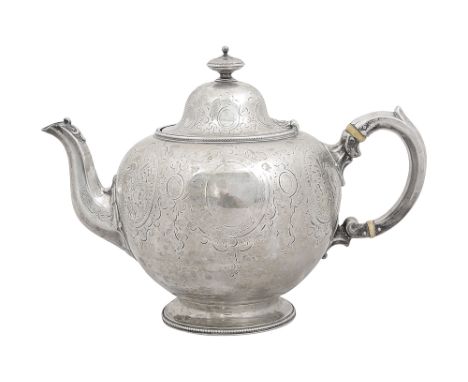 Am early Victorian silver teapotLondon, 1857, Edward & John Barnard, of bellied form and with a domed lid, engraved throughou