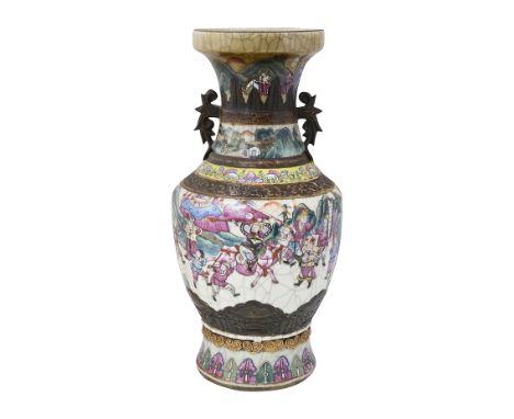 A late 19th century Chinese Nanking crackle glazed famille rose vase of baluster form with twin scroll handles, decorated in 