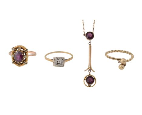 An Edwardian amethyst drop pendant on chainthe central circular collet-set amethyst to the smaller similarly-set amethyst sur