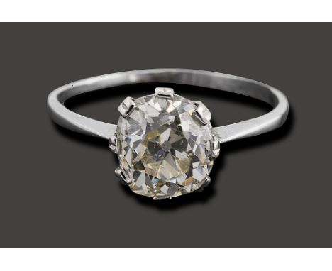 A diamond single stone ringthe cushion-shaped old brilliant-cut diamond measuring 9.1mm x 8.1mm x 5.7mm coronet-set to the pl