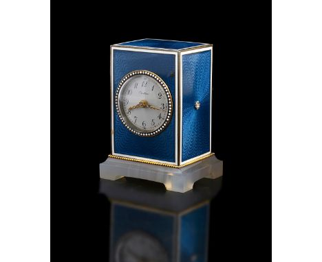 Cartier. A French gold, enamel and chalcedony carriage timepiece c.1910circular white enamel dial with black Arabic numerals 