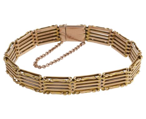 A 15ct fancy gate braceletthe five bar bracelet marked on the fastening 15ct, with safety chainweight 17gCondition: in good w