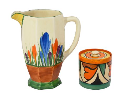 A Clarice Cliff Bizarre 'Double V' preserve pot and a Bizarre Crocus jugfirst drum shape, painted with a stylised leaf and ge