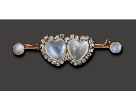 A mid Victorian sentimental moonstone and diamond-set bar broochthe yellow gold knife edge bar centrally-set with two conjoin