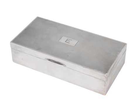 An Elizabeth II silver table cigarette box Birmingham, 1959, E &amp; N Speak plain rectangular form with hinged engine turned