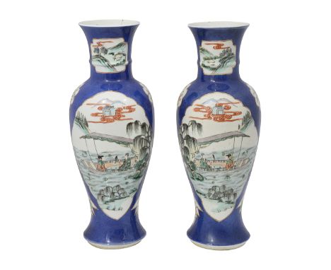 A pair of Chinese powder blue ground famille verte vases19th centurythe baluster form body with a trumpet neck, the shaped re