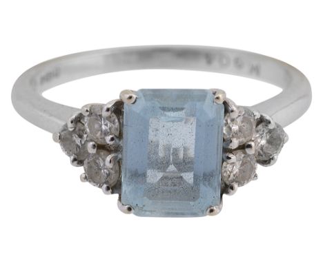 An aquamarine and diamond-set ringthe rectangular step-cut aquamarine set with a diamond-set trefoil to either side, to the h