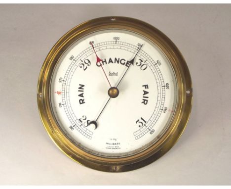 BAROMETER. An English Sestrel marine barometer in bulkhead case. Diameter 16.5cm.