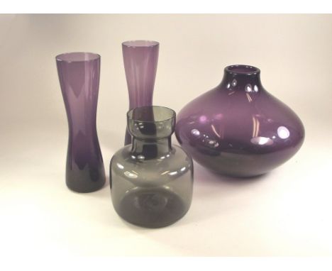 WHITEFRIARS GLASS.Four Powell, Whitefriars soda glass vases, the two amethyst waisted vases with original 9594 design number 