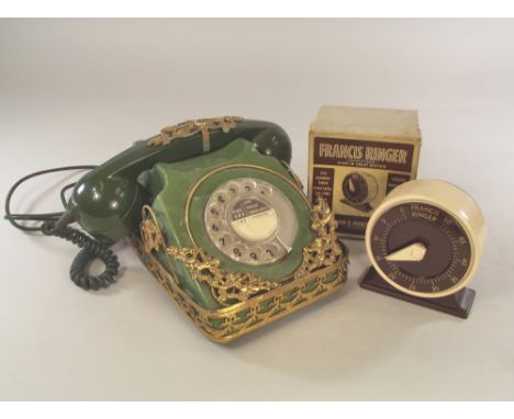 TELEPHONE ETC. A G.P.O. two-tone green No.746 telephone in 1960's gilt metal frame. Also a 1960's brown & cream Bakelite Fran