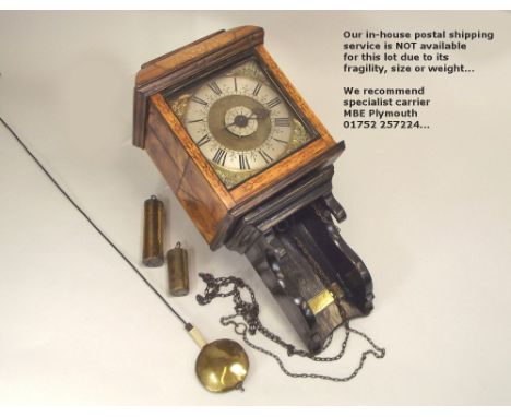 ALARM WALL CLOCK.A George IV hooded wall alarm clock, the 7 inch square dial with silvered chapter ring & alarm disc & single