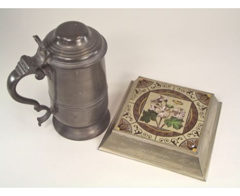 DUNHILL TANKARD ETC.An Alfred Dunhill pewter tankard, 22cm & a Victorian tiled teapot stand, in nickel frame.