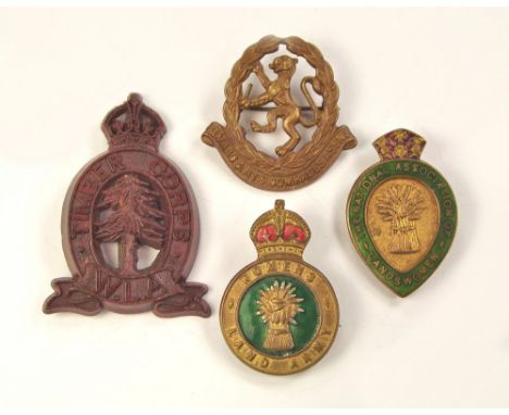 WOMEN'S LAND ARMY BADGES ETC. A scarce W.L.A. Timber Corps plastic economy badge by Stanley, Walsall, a 'Women's Land Army' p