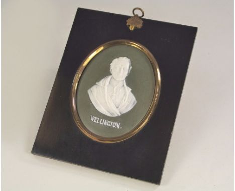 WELLINGTON. A Jasper ware portrait plaque of Wellington, in ebonised frame. Plaque size 11 x 8.5cm oval.