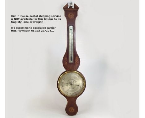 BAROMETER/THERMOMETER.A late 19th century banjo barometer/thermometer by Robert Squirrel, Stowmarket. The mahogany case with 
