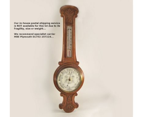 BAROMETER. An oak cased, Admiral Fitzroys Indications, aneroid barometer/thermometer. Height 90cm.
