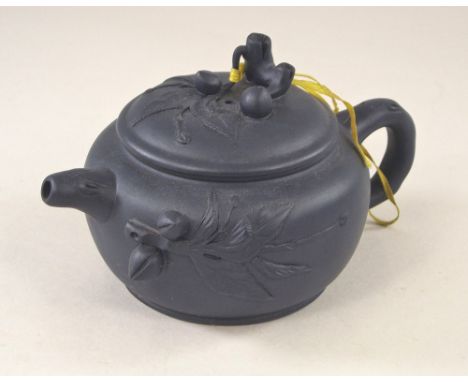 CHINESE TEAPOT. A Chinese Yixing-style blue clay teapot, with applied decoration. Stamped seal mark to base, lid & handle. He