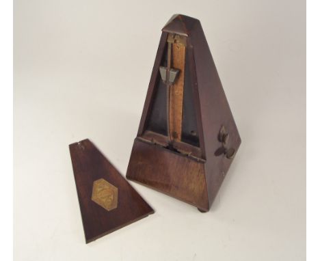 METRONOME. A metronome by Maelzel (lacks one bun foot).