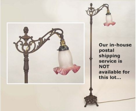 STANDARD LAMP. A 19th century brass & cast iron standard lamp with shade. Height 146cm.