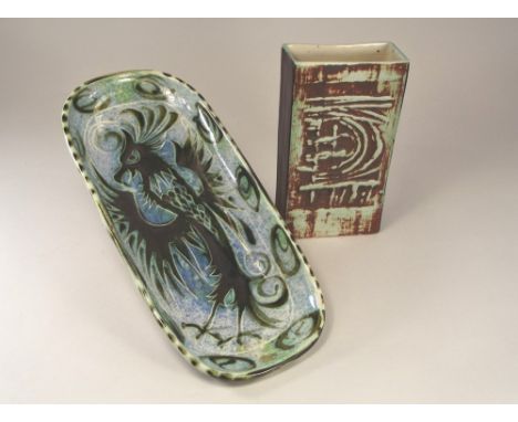 CELTIC & TREMAEN. A Celtic Pottery 'Folksy' dish with paper label, length 35cm. & a Tremaen Pottery vase, height 20cm.