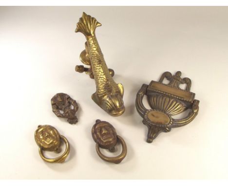 DOOR KNOCKERS. A large Adams style brass door knocker, 19cm & three other door knockers.