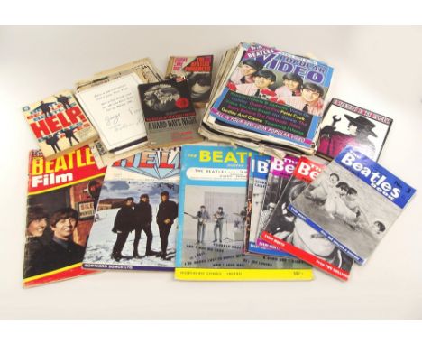 THE BEATLES.A collection of Beatles ephemera, including cuttings, three paperback books, a first edition of John Lennon's 'A 
