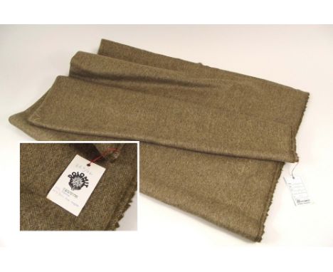 TEXTILES. A length of herringbone suiting fabric (85% wool/15% Alpaca) by Moessmer, Bolzano, Italy. 2yds 9ins x 60ins.