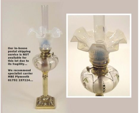 OIL LAMP. A French oil lamp with painted glass fount & pearlised glass shade. Height 49cm.