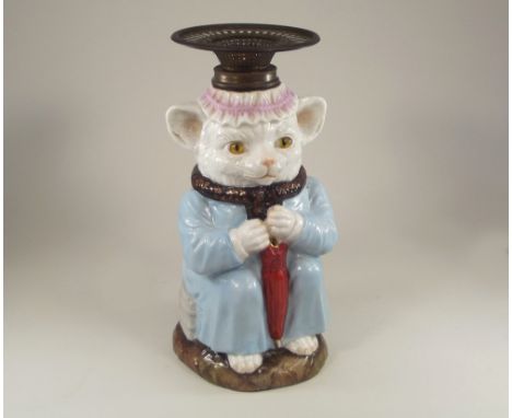 OIL LAMP. A 19th century, continental porcelain cat oil lamp. Rd. 37028, PSL stamped to base, (lacks wick). Height 28cm.